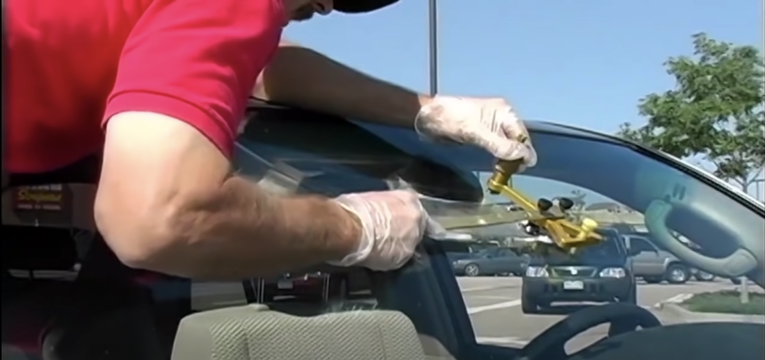 Windshield repair being done by an auto glass specialist